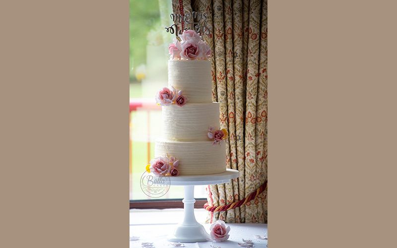 Whitewed Approved Wedding Cake designer Bella Cakes by Sharon Swindon Wiltshire buttercream pink sugar craft rose flowers