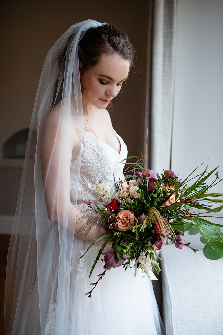 Whitewed Directory supplier of the month blog Willoughby and Wolf Bridal Boutique Marlborough Wiltshire Antonia Grace Photography styled shoot large bouquet of rich coloured flowers and foliage brides veil