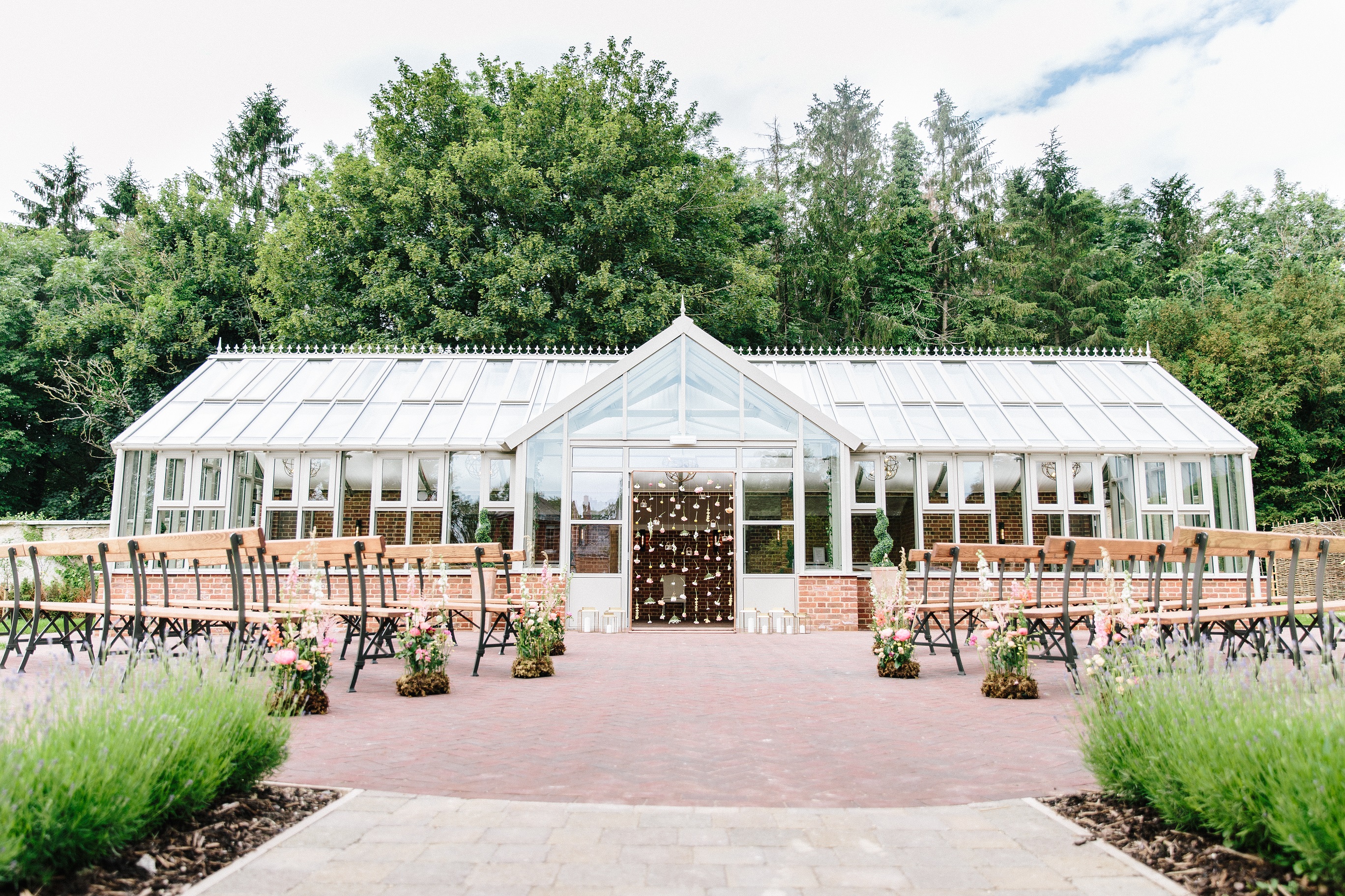 Syrencot Wiltshire near Salisbury Exclusive use secluded bespoke and brand new wedding venue for ceremony and reception The Glasshouse outdoor ceremony 