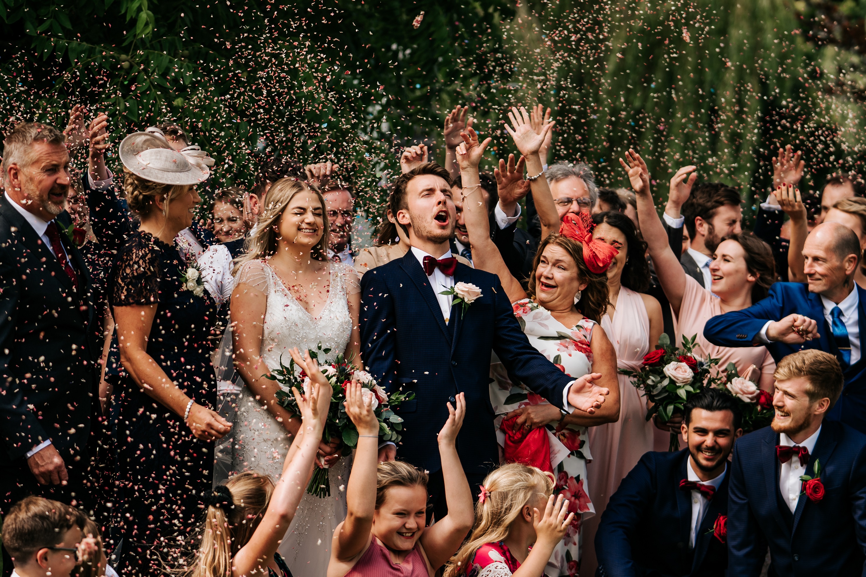 March supplier of the month Whitewed directory blog Paulfolio Photography bath based wedding photographer duo just married confetti shot celebrations