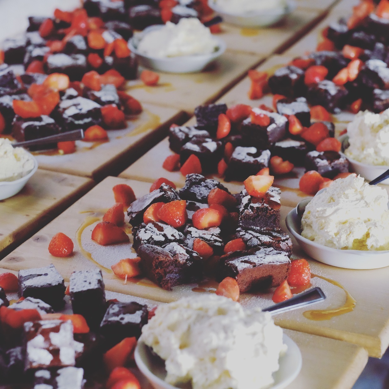 From the professionals blog on Eco-friendly weddings catering and florist Vaughan's Kitchen and Corky and Prince Swindon Wiltshire chocolate brownie and strawberries wedding breakfast dessert